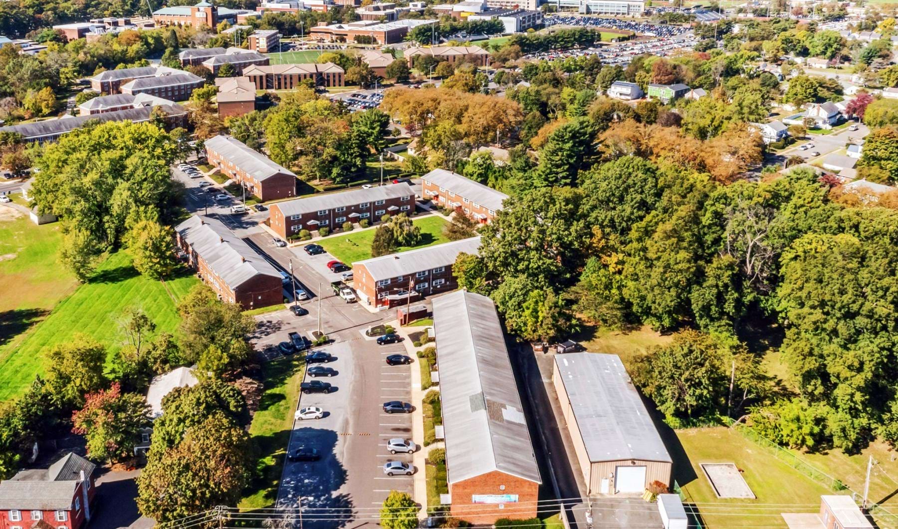 a group of buildings and trees